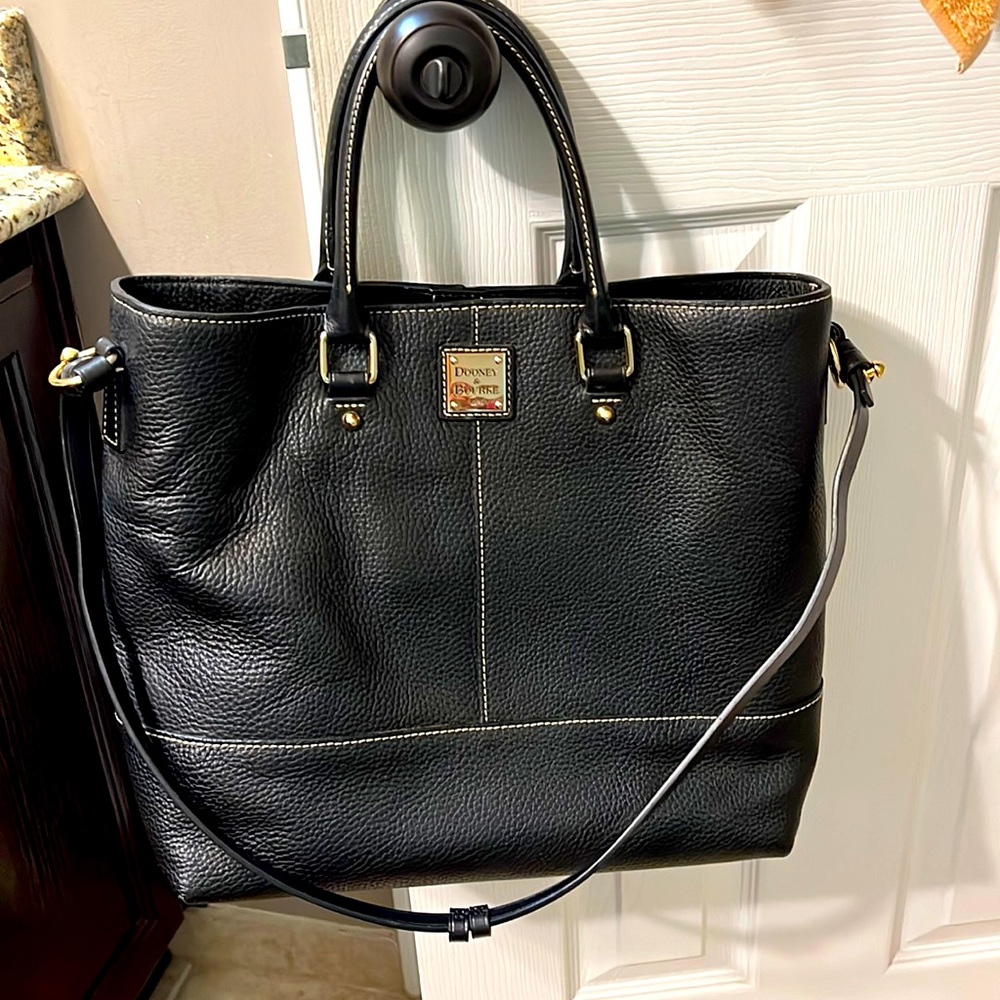 Dooney and Bourke large black leather tote with red lining